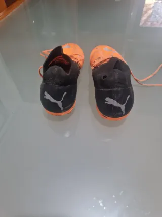 Scarpe da calcio Puma arancioni e nere