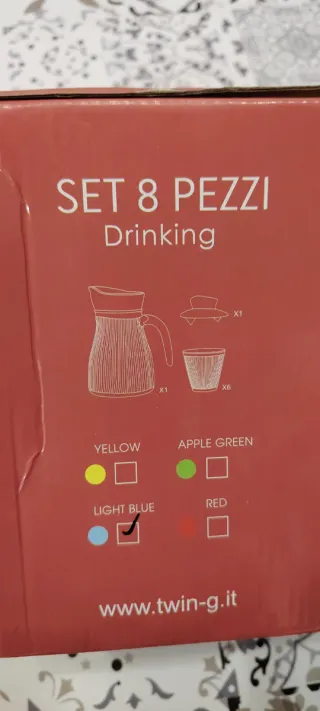 Caraffa e bicchieri in vetro