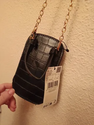 Mini bolso móvil cadena dorada