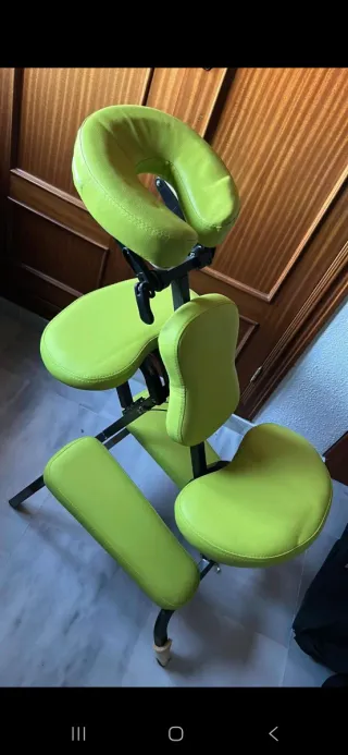Silla de masajes.Con funda para guardarla.