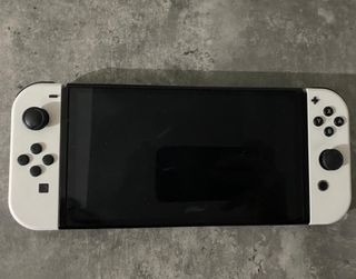Nintendo Switch OLED + Juego