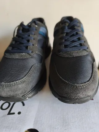 Zapatillas Joya grises y azules.unisex.solo envio