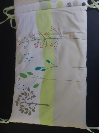 Textiles de cuna con protector acolchado
