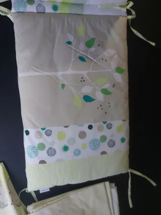 Textiles de cuna con protector acolchado