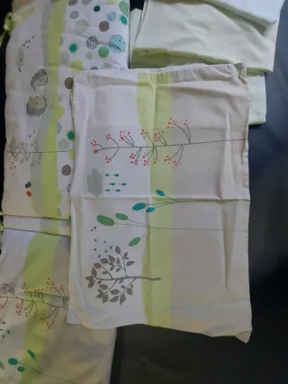 Textiles de cuna con protector acolchado