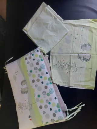 Textiles de cuna con protector acolchado