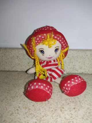 Muñeca de trapo con vestido a rayas