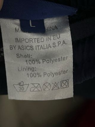 Pantalón deportivo Asics azul y blanco