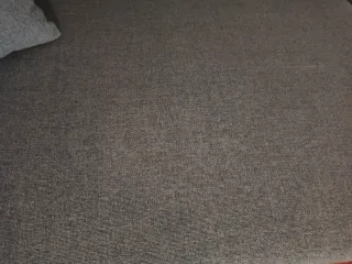 Sofá cama gris tela