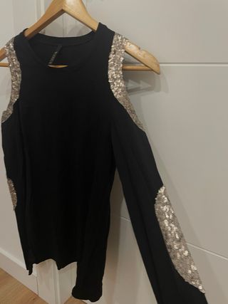 Top negro con lentejuelas dorado talla S