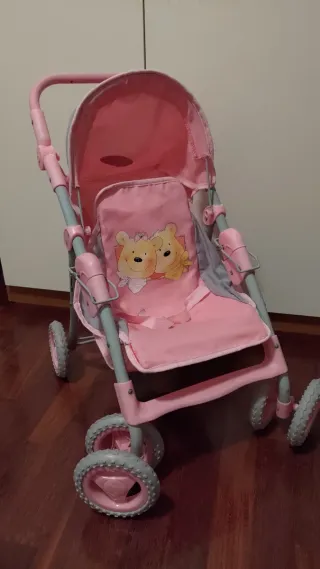 Carrozzina per bambola rosa