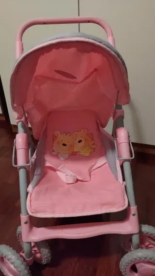 Carrozzina per bambola rosa