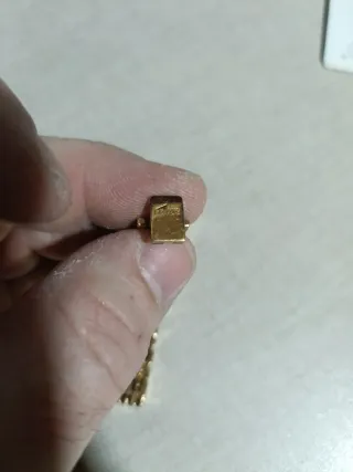 Reloj Lotus Dorado chapado en oro  prueba de ácido