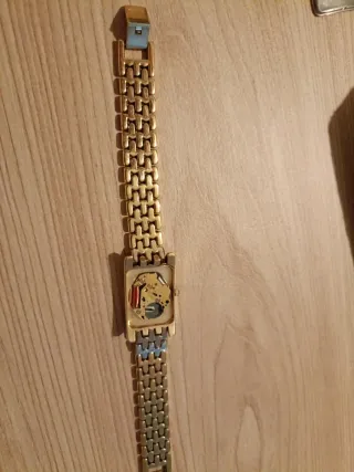 Reloj Lotus Dorado chapado en oro  prueba de ácido