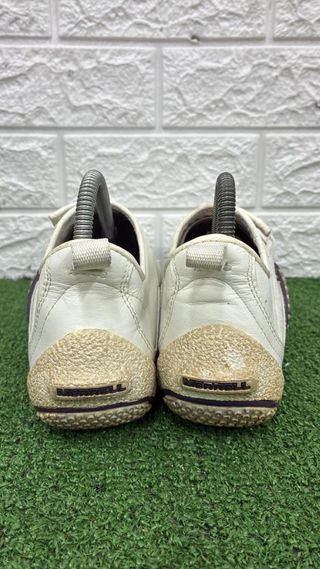 Scarpe donna bianche difetto in foto