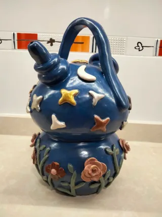 Botijo azul decorado estrellas y flores