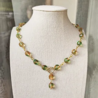 Collana con cristalli sfumati oro e verdi