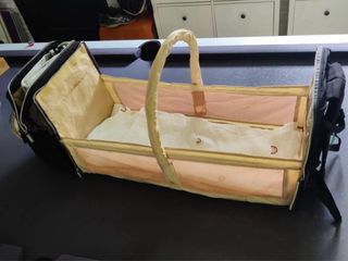 Mochila con cambiador y cuna incorporada