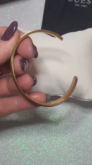 Bracciale Guess oro con logo