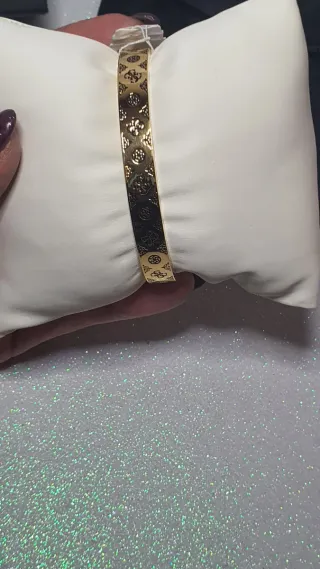 Bracciale Guess oro con logo