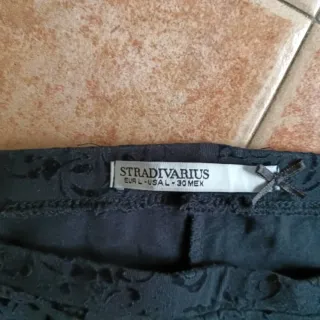 Pantalones negros y de leopardo