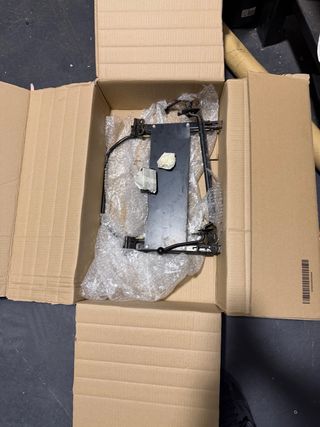 Soporte asiento y luz matrícula