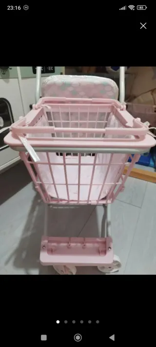 Carro de la compra  de juguete como nuevo