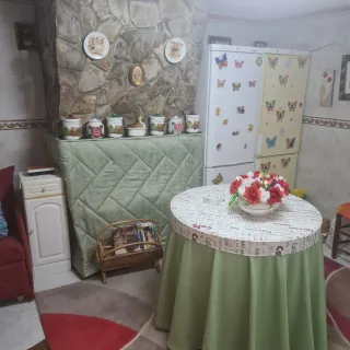 Sofá y butaca de tela