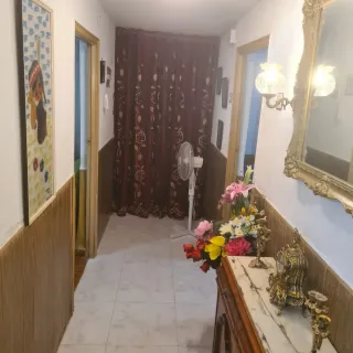 Sofá y butaca de tela