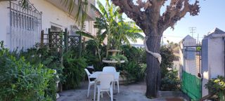 CASA EN PLANTA BAJA CON  TERRAZA , PATIO YNEGOCIO
