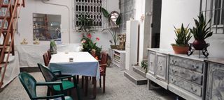 CASA EN PLANTA BAJA CON  TERRAZA , PATIO YNEGOCIO