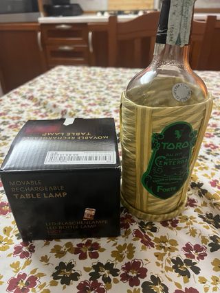 Lampada bottiglia Toro in paglia