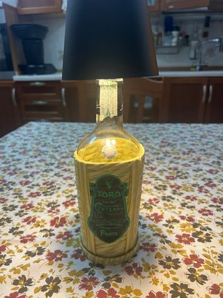 Lampada bottiglia Toro in paglia