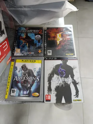 PlayStation 3 Negra + 8 Juegos