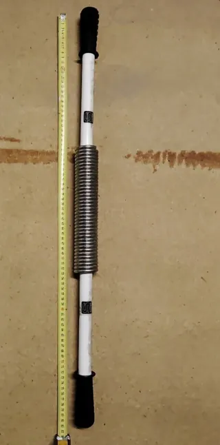 Barra de ejercicio con muelle