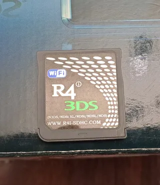 Nintendo 3DS Azul Aqua con caja y manuales.