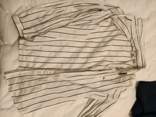 Camisa Lacoste rayas blanca y negra