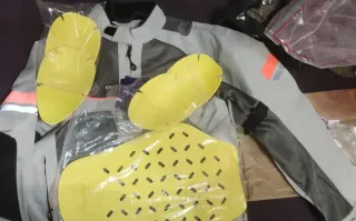 Chaqueta de moto talla L gris y naranja