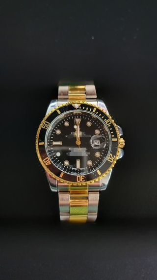 Reloj bicolor dorado y plateado