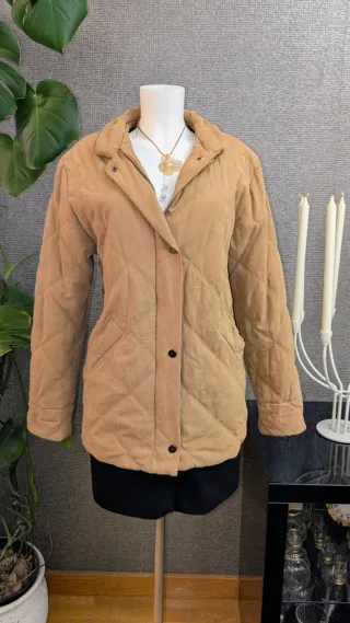 Cappotto imbottito in pelle di pesca