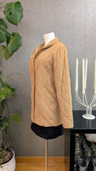 Cappotto imbottito in pelle di pesca