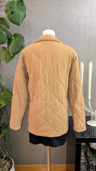 Cappotto imbottito in pelle di pesca