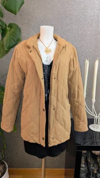 Cappotto imbottito in pelle di pesca