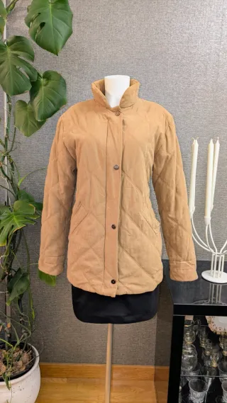 Cappotto imbottito in pelle di pesca