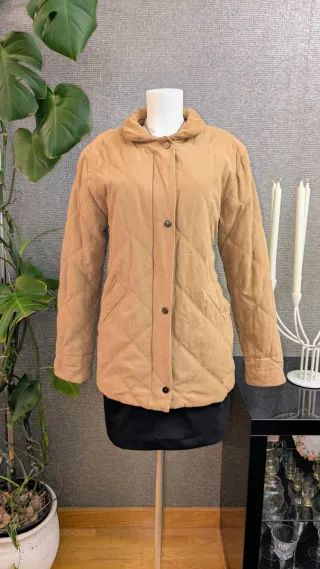 Cappotto imbottito in pelle di pesca