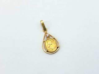 medalla oro 18k con piedra con circonita