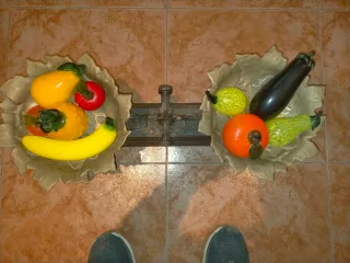 Báscula de hierro con platos de bronce