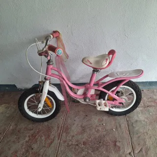 Bicicleta infantil rosa hasta 4 años