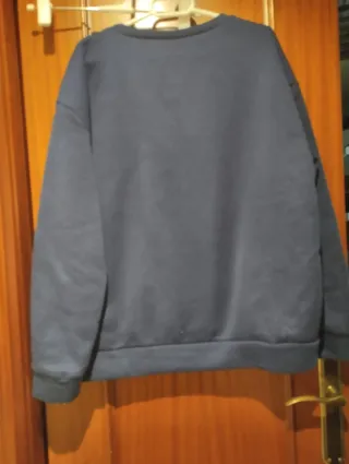 Sudadera azul con estampado de atardecer