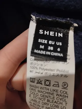 Sudadera azul con estampado de atardecer